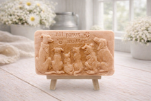 Load image into Gallery viewer, A rectangular handmade vegan soap bar gift, featuring a detailed relief carving of several dogs and a cat sitting together, with the words "all paws matter" and two paw prints embossed at the top, displayed on a wooden easel. Made in Blackpool.