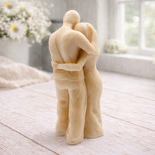 Load image into Gallery viewer, A 3D handmade vegan soap in a warm cream tone, sculpted into a standing figure of a pregnant couple; the partner stands behind the expectant mother, tenderly cradling her baby bump, displayed on a light wooden surface in a bright farmhouse setting.