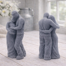 Load image into Gallery viewer, A 3D handmade vegan soap in a warm cream tone, sculpted into a standing figure of a pregnant couple; the partner stands behind the expectant mother, tenderly cradling her baby bump, displayed on a light wooden surface in a bright farmhouse setting.