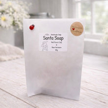 Load image into Gallery viewer, White soap packaging with branding on a light wooden surface