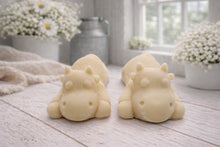 Load image into Gallery viewer, A handmade vegan soap gift set featuring two soaps sculpted into cute, sleeping cows, presented in a brown kraft box tied with a red raffia ribbon and a small ladybird embellishment.