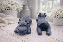 Load image into Gallery viewer, A handmade vegan soap gift set featuring two soaps sculpted into cute, sleeping cows, presented in a brown kraft box tied with a red raffia ribbon and a small ladybird embellishment.