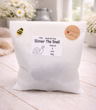 Load image into Gallery viewer, White bag with product label on a light wooden surface