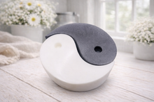 Load image into Gallery viewer, A handmade vegan soap gift set featuring two interlocking teardrop-shaped bars in contrasting black and white to form a large yin and yang symbol, displayed on a light wooden surface.