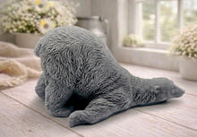 Load image into Gallery viewer, Huge highly detailed polar bear shaped vegan bar soap, handmade and resting on a rustic wooden table with floral backdrop - ideal sustainable gift idea for animal lovers