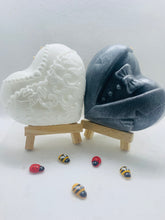 Load image into Gallery viewer, Handmade vegan soaps featuring a charcoal groom soap and a detailed bride soap. gift boxed in beautiful eco friendly packaging. crafted with natural French clays, activated charcoal and essential oils. a eco-friendly, zero waste gift that’s cruelty-free, skin-nourishing, the perfect gift for any wedding. UK Small Business