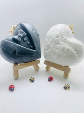 Load image into Gallery viewer, Handmade vegan soaps featuring a charcoal groom soap and a detailed bride soap. gift boxed in beautiful eco friendly packaging. crafted with natural French clays, activated charcoal and essential oils. a eco-friendly, zero waste gift that’s cruelty-free, skin-nourishing, the perfect gift for any wedding. UK Small Business