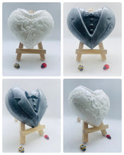 Load image into Gallery viewer, Handmade vegan soaps featuring a charcoal groom soap and a detailed bride soap. gift boxed in beautiful eco friendly packaging. crafted with natural French clays, activated charcoal and essential oils. a eco-friendly, zero waste gift that’s cruelty-free, skin-nourishing, the perfect gift for any wedding. UK Small Business