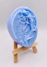 Load image into Gallery viewer, Handmade vegan Guardian Angel soap bar, features a detailed angel with flowing wings. Natural, cruelty-free UK soap ideal for spiritual gifts, zero waste skincare, and sustainable bathroom décor. British-made artisan soap perfect for eco-conscious shoppers. Wrapped in beautiful eco friendly packaging . Small business UK
