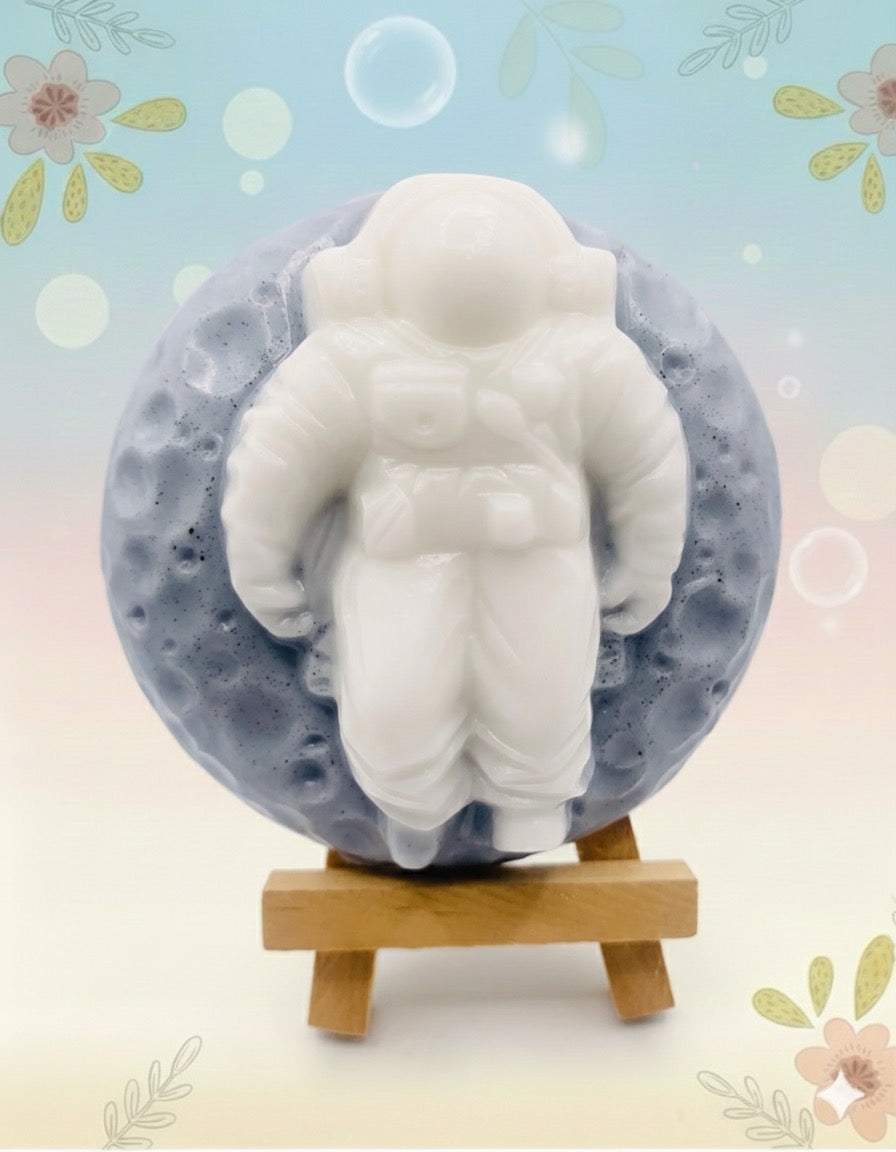 space gift | handmade vegan soap featuring a space cadet and the moon. Available in your choice of essential oil. Vegan and cruelty free wrapped in beautiful eco friendly packaging. Small business UK 