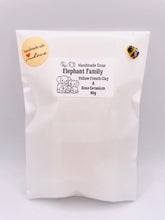 Load image into Gallery viewer, Handmade vegan soap featuring an elephant family with baby elephant and packed in beautiful eco friendly packaging. crafted with natural French clays, activated charcoal and essential oils. a eco-friendly, zero waste gift that’s cruelty-free, skin-nourishing, and perfect for elephant lovers or animal themed gifts. Small business UK

