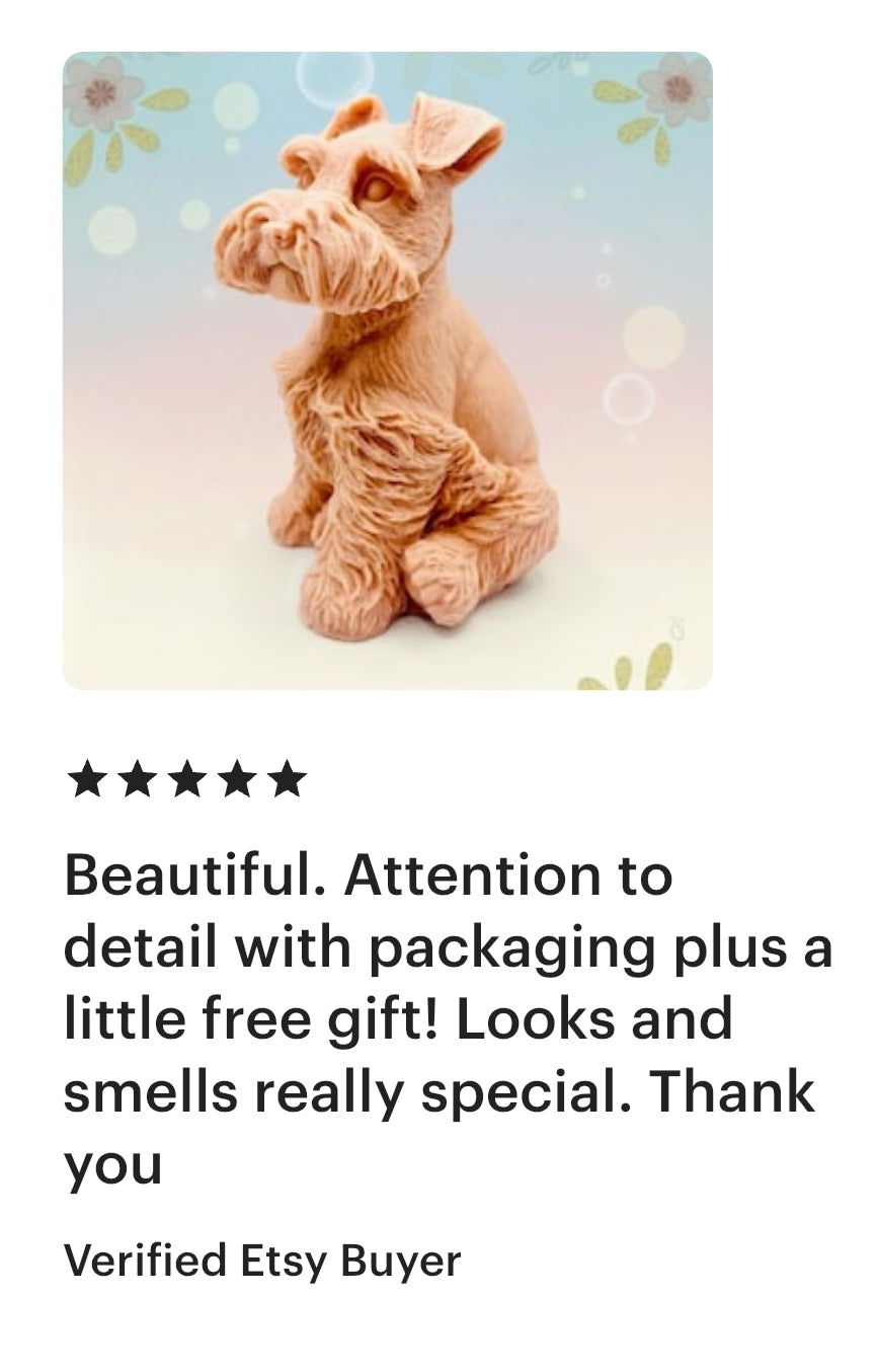 A detailed large handmade vegan soap in the shape of a Schnauzer dog, created by Soap Simple Creations