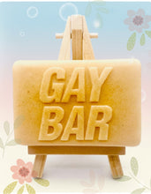 Load image into Gallery viewer, Handmade vegan soaps featuring the wording GAY BAR novelty gift. crafted with natural French clays, activated charcoal and essential oils. a eco-friendly, zero waste gift that’s cruelty-free, skin-nourishing, and perfect for pride gifts and LGBTQ gifts, hen party favours. wrapped in beautiful eco friendly packaging. 
