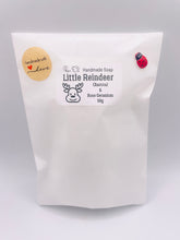 Load image into Gallery viewer, Handmade vegan soaps featuring a cute reindeer in beautiful eco friendly packaging. crafted with natural French clays, activated charcoal and essential oils. a eco-friendly, zero waste gift that’s cruelty-free, skin-nourishing, the perfect gift for reindeer lovers, or for animal lover gifts. small business UK
