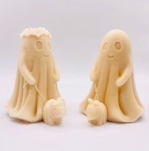 Load image into Gallery viewer, Ghost Girl Walking Dog Vegan Soap 
This charming soap features a girl ghost with flowers on her head, out for a stroll with their loyal pup. Perfect for Halloween lovers or anyone who enjoys a touch of spooky decor. Made with gentle, skin-loving ingredients, it’s as fun to display as it is to use. A gift for ghost fans and dog lovers alike! 

🎨 French Clay Colour Options:
• Pink Clay for a soft pink
• Charcoal for a grey tone
• Yellow Clay for a soft yellow shade
• Indigo Powder for a blue tone
• Red 
