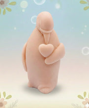 Load image into Gallery viewer, Handmade vegan soaps featuring a penguin holding a love heart  packaged in beautiful eco friendly packaging crafted with natural French clays, activated charcoal and essential oils. a eco-friendly, zero waste gift that’s cruelty-free, skin-nourishing, and perfect for penguin lovers, christmas gifts and animal themed gifts. small business UK
