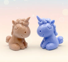 Load image into Gallery viewer, Handmade vegan soaps featuring a cute happy unicorn wrapped in beautiful eco friendly packaging. crafted with natural French clays, activated charcoal and essential oils. a eco-friendly, zero waste gift that’s cruelty-free, skin-nourishing, the perfect gift for unicorn lovers, or for animal lover gifts. small business UK
