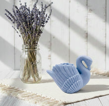 Load image into Gallery viewer, A beautiful handmade vegan soap in the shape of a graceful swan with detailed wing feathers, displayed against a whimsical background for an elegant farmhouse decor gift. 
