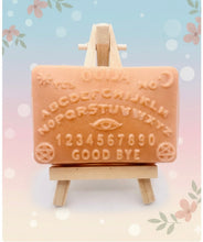 Load image into Gallery viewer, Ouija board design handmade vegan soap. Available in your choice of colour of French clay and essential oil. Perfect Halloween gift. Wrapped in beautiful eco friendly packaging. Small business UK
