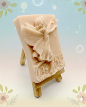 Load image into Gallery viewer, Handmade vegan soap featuring a pretty fairy chasing a butterfly and packaged in beautiful eco friendly packaging. crafted with natural French clays, activated charcoal and essential oils. a eco-friendly, zero waste gift that’s cruelty-free, skin-nourishing, and perfect for fairy lovers and whimsical themed gifts. Small business UK

