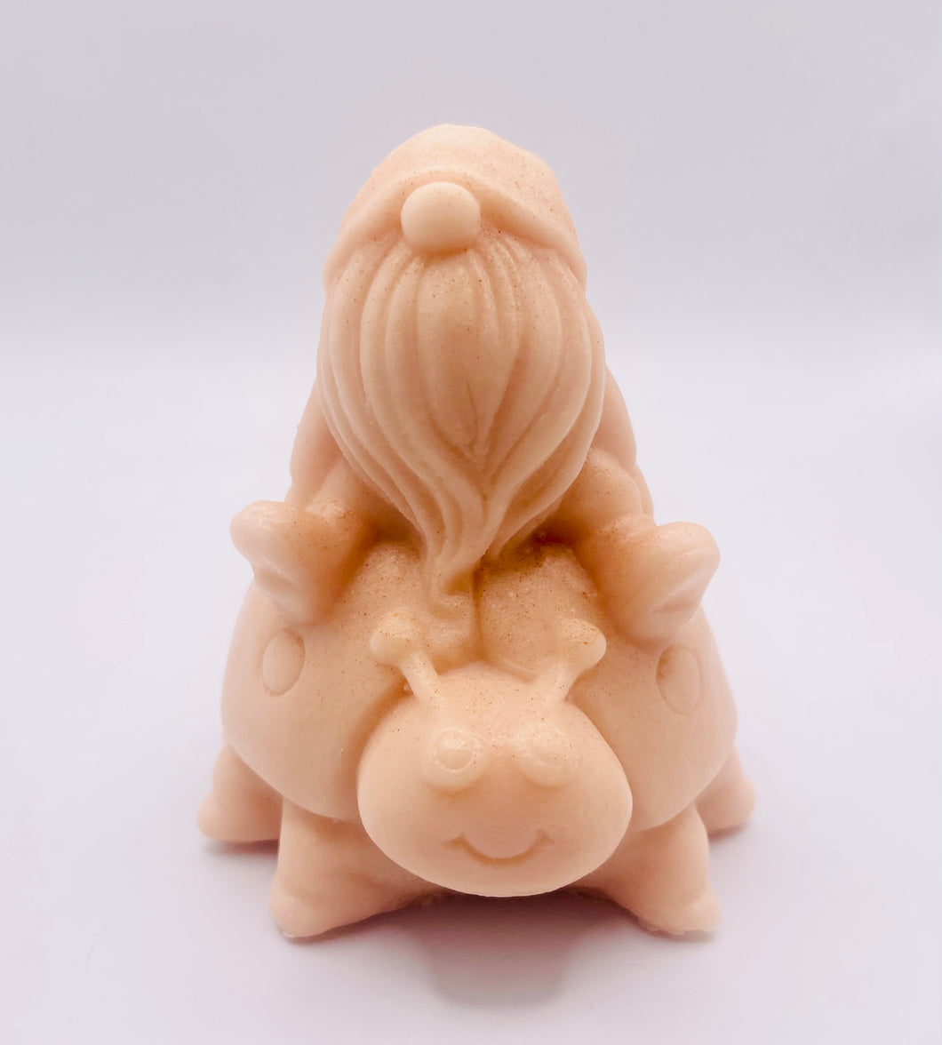 Handmade vegan soaps featuring a detailed ladybug with a gnome catching a ride on his back soap. crafted with natural French clays, activated charcoal and essential oils. a eco-friendly, zero waste gift that’s cruelty-free, skin-nourishing, and perfect for turtle lovers and gnome lover gifts. small business UK