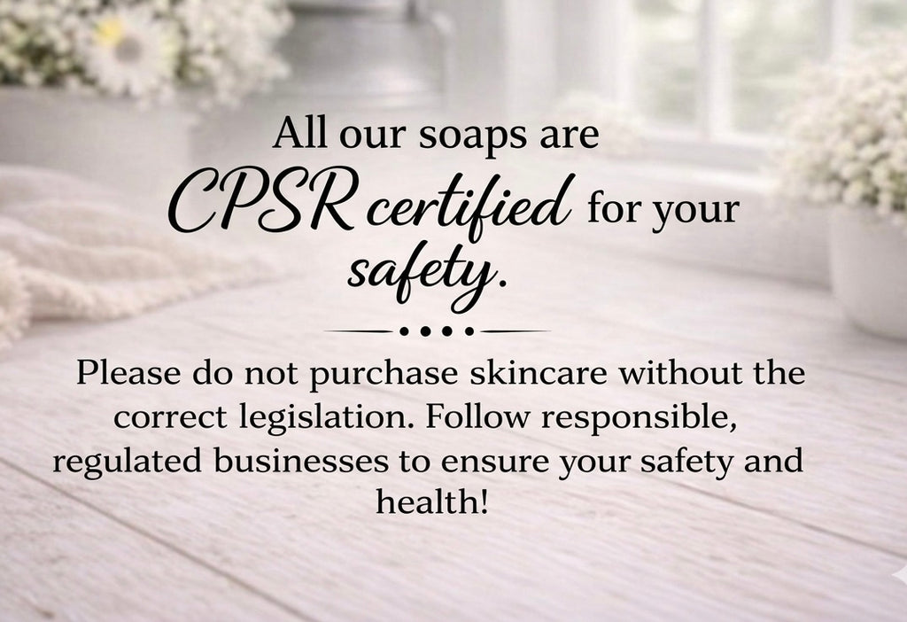 Text on a wooden surface with soap bars and flowers, emphasising CPSR certification for safety.