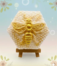 Load image into Gallery viewer, Handmade vegan soap with a gold bee and honeycomb design
