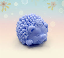 Load image into Gallery viewer, Handmade vegan soaps featuring a cute waving hedgehog, packaged in beautiful eco friendly packaging. crafted with natural French clays, activated charcoal and essential oils. a eco-friendly, zero waste gift that’s cruelty-free, skin-nourishing, the perfect gift for hedgehog lovers and animal lovers. small business UK
