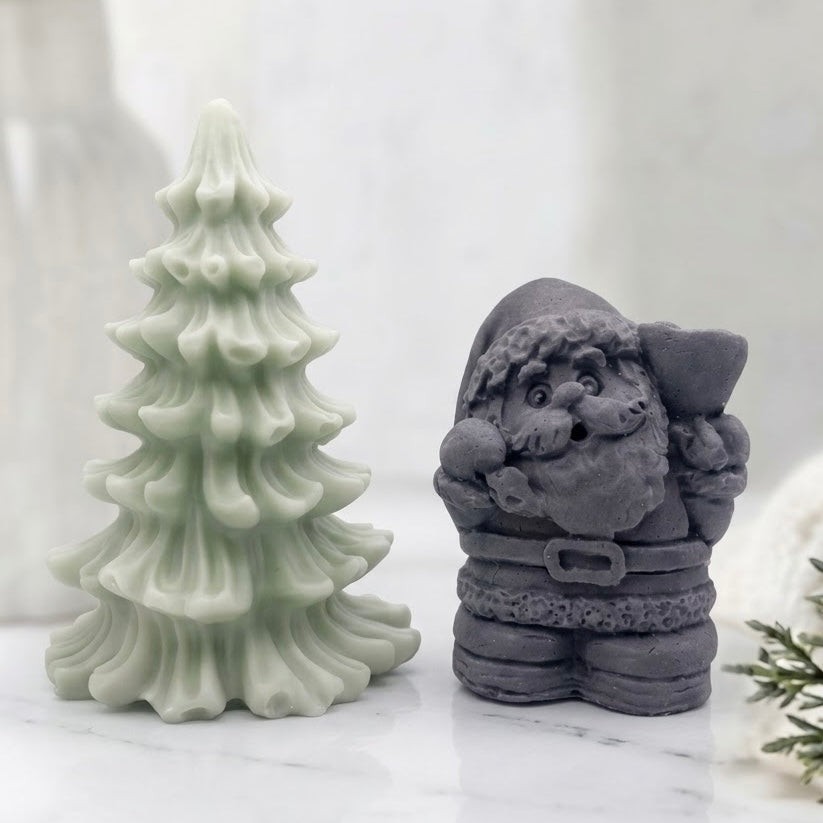 Elegant dark charcoal Santa Claus and detailed sage green Christmas Tree soap set. A perfect blend of style and practicality for the holidays.