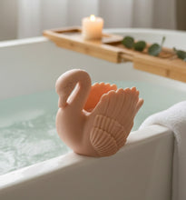 Load image into Gallery viewer, A beautiful handmade vegan soap in the shape of a graceful swan with detailed wing feathers, displayed against a whimsical background for an elegant farmhouse decor gift. 
