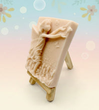Load image into Gallery viewer, Handmade vegan soap featuring a pretty fairy chasing a butterfly and packaged in beautiful eco friendly packaging. crafted with natural French clays, activated charcoal and essential oils. a eco-friendly, zero waste gift that’s cruelty-free, skin-nourishing, and perfect for fairy lovers and whimsical themed gifts. Small business UK
