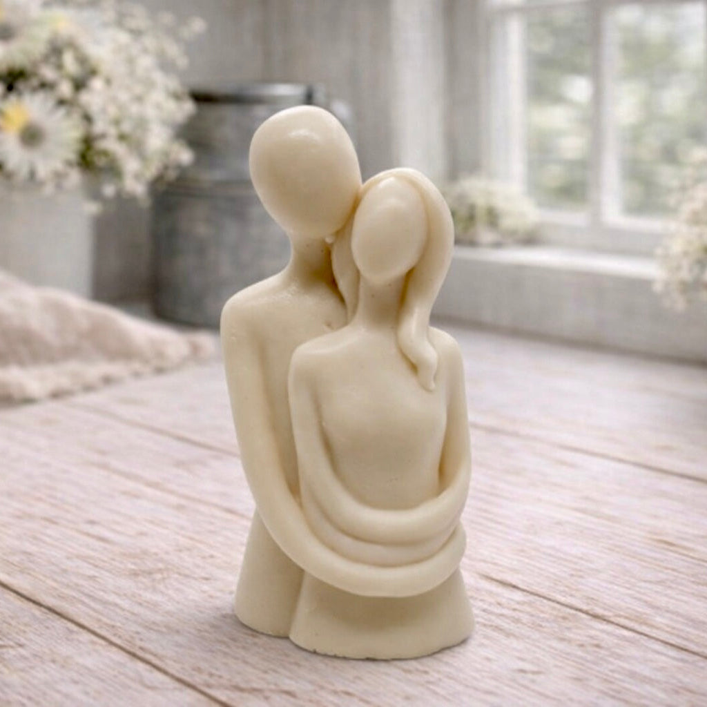 Handmade vegan soaps featuring a man embracing a woman, in beautiful eco friendly packaging.
