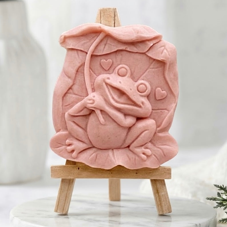 Handmade novelty frog vegan soap bar, artisan cruelty-free soap in a soft pink colour made with natural plant-based ingredients and french clay.
