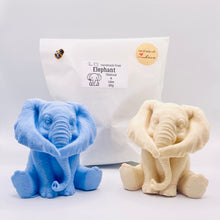 Load image into Gallery viewer, Handmade vegan soap featuring a large chunky elephant with big floppy ears . crafted with natural French clays, activated charcoal and essential oils. a eco-friendly, zero waste gift that’s cruelty-free, skin-nourishing, and perfect for animal lover gifts and gifts for her. UK Small Business. 
