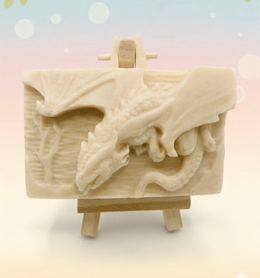 Dragon gift. Dinosaur gift. Our Flying Dragon soap features a striking dragon with its majestic wings spread wide, symbolising freedom and power. This artisan bar is vegan, cruelty-free, and designed with care for both your skin and the planet. Available in your choice of colour and essential oil. Each soap comes beautifully wrapped in eco friendly packaging. zero waste gift. kodern gift ideas. handmade home style. eco conscious home. eco friendly gifts. go green home. 