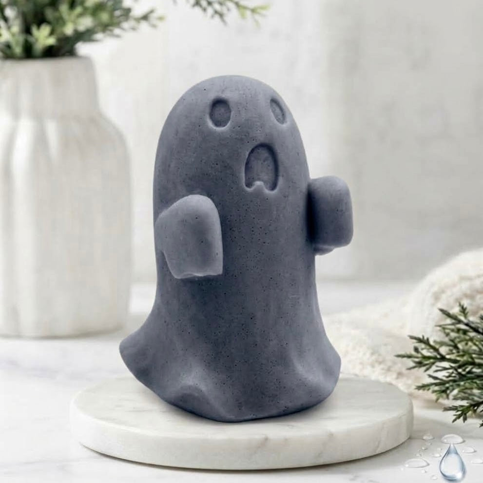 A charcoal grey ghost soap gift on a marble base.
