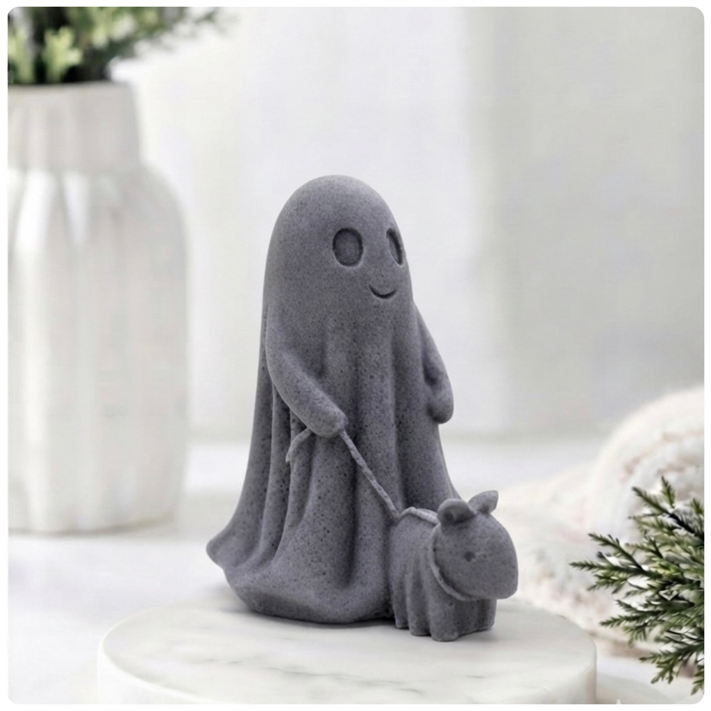 Decorative vegan soap figure of a ghost with a dog on a leash in a bright room with flowers.