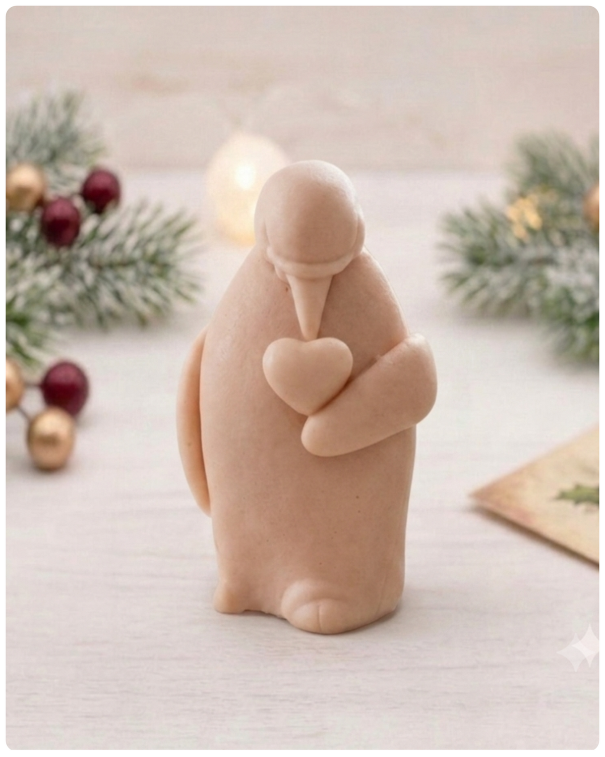 Handmade vegan soaps featuring a penguin holding a love heart  packaged in beautiful eco friendly packaging. Valentine’s Day gift idea 