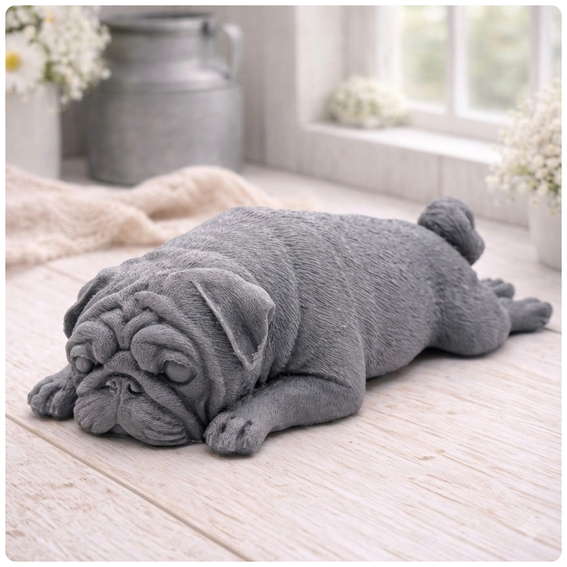 A detailed handmade vegan soap gift, sculpted in the shape of a pug dog lying flat on its stomach in a sleeping position, showing realistic skin folds and fur texture