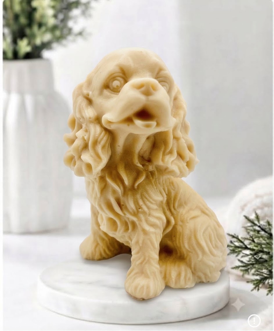 Handmade springer spaniel vegan soap sculpted in a sitting pose with textured fur and detailed floppy ears, resting on a marble display pedestal.