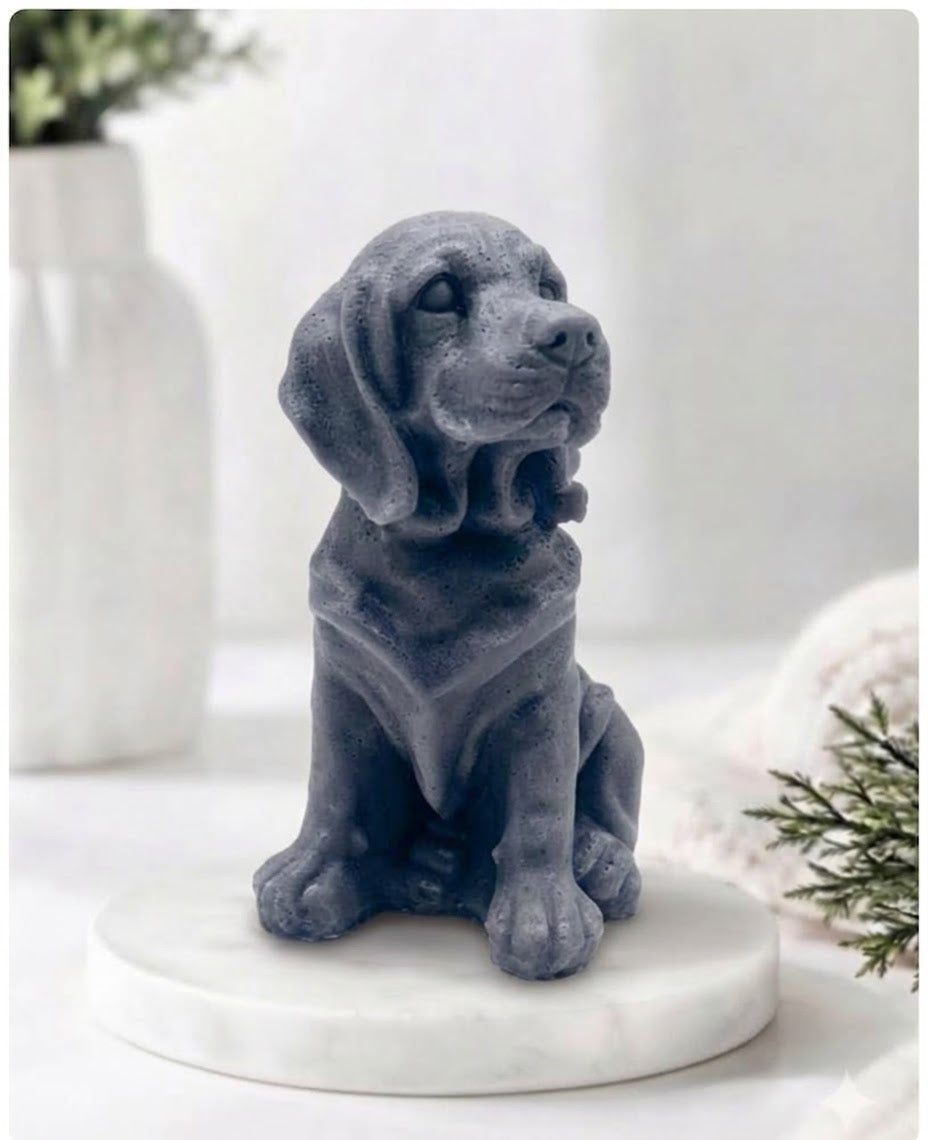 A charcoal Golden Retriever soap sitting on a white marble display stand with a soft bathroom background.