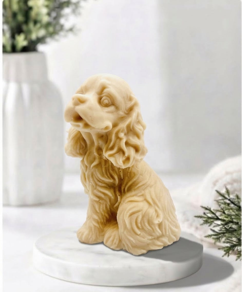 Handmade springer spaniel vegan soap sculpted in a sitting pose with textured fur and detailed floppy ears, resting on a marble display pedestal.