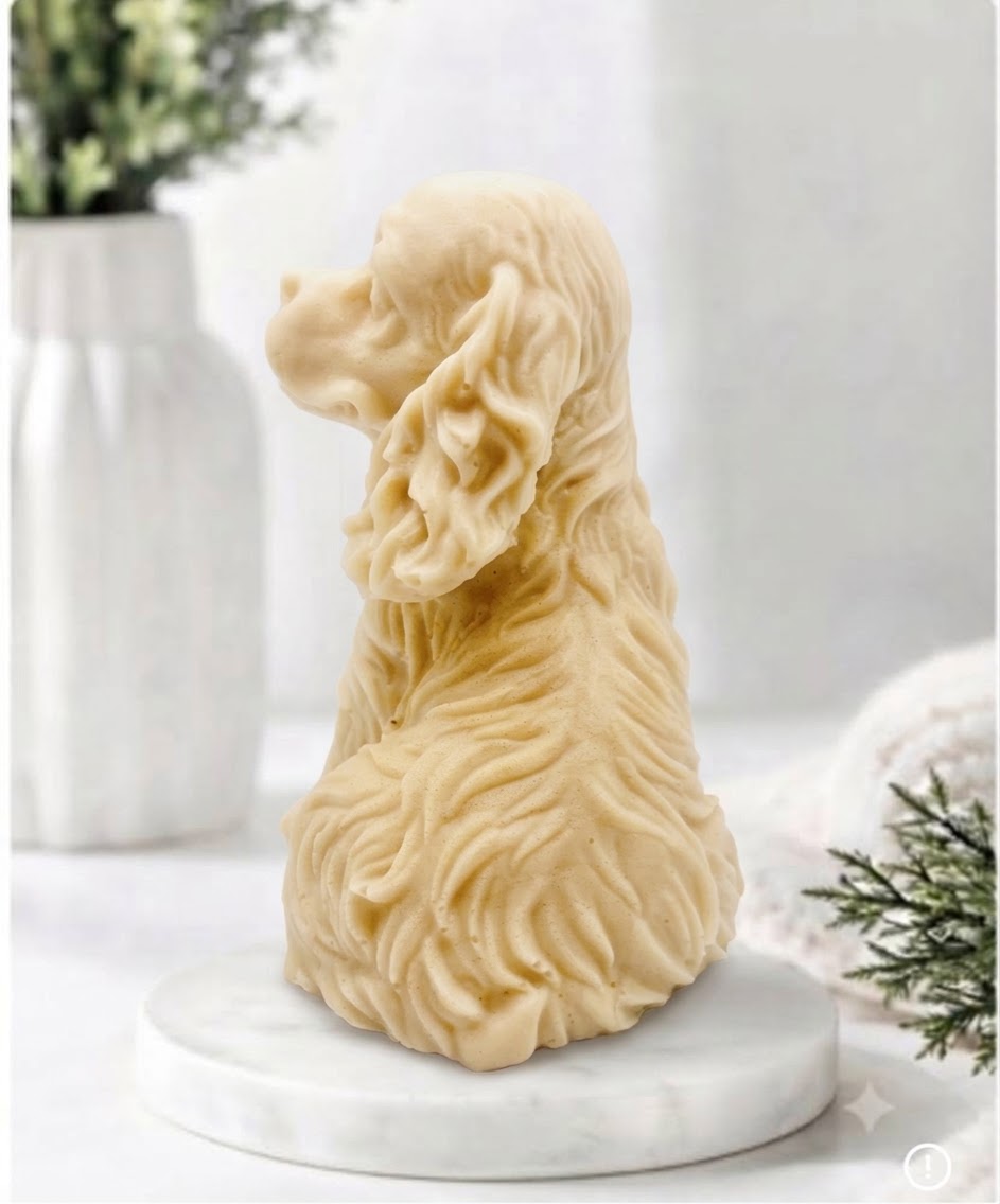 Handmade springer spaniel vegan soap sculpted in a sitting pose with textured fur and detailed floppy ears, resting on a marble display pedestal.
