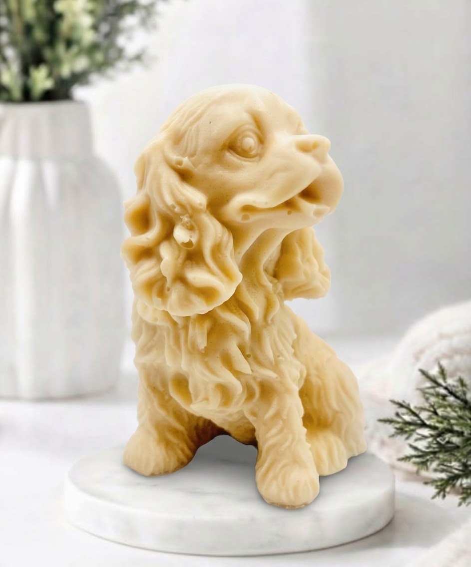 Handmade springer spaniel vegan soap sculpted in a sitting pose with textured fur and detailed floppy ears, resting on a marble display pedestal.