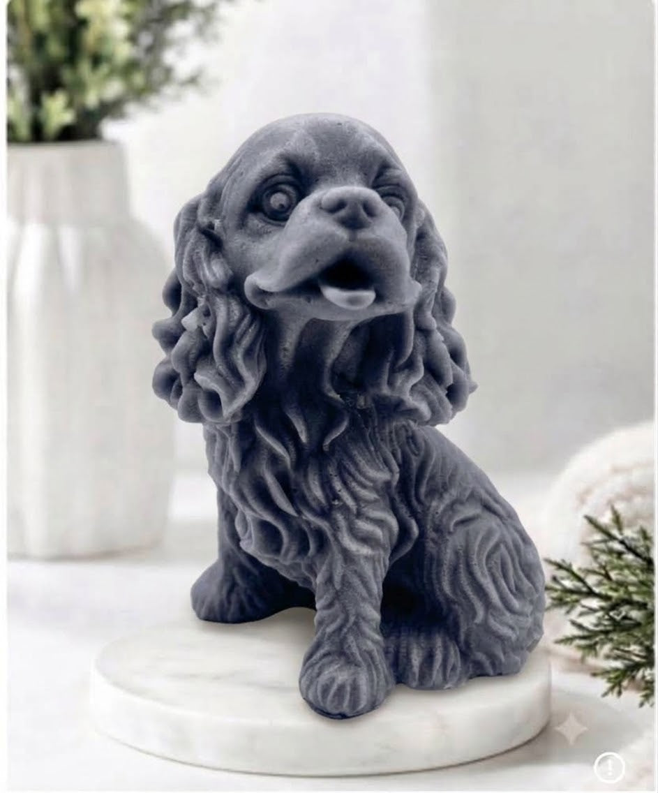 Handmade springer spaniel vegan soap sculpted in a sitting pose with textured fur and detailed floppy ears, resting on a marble display pedestal.