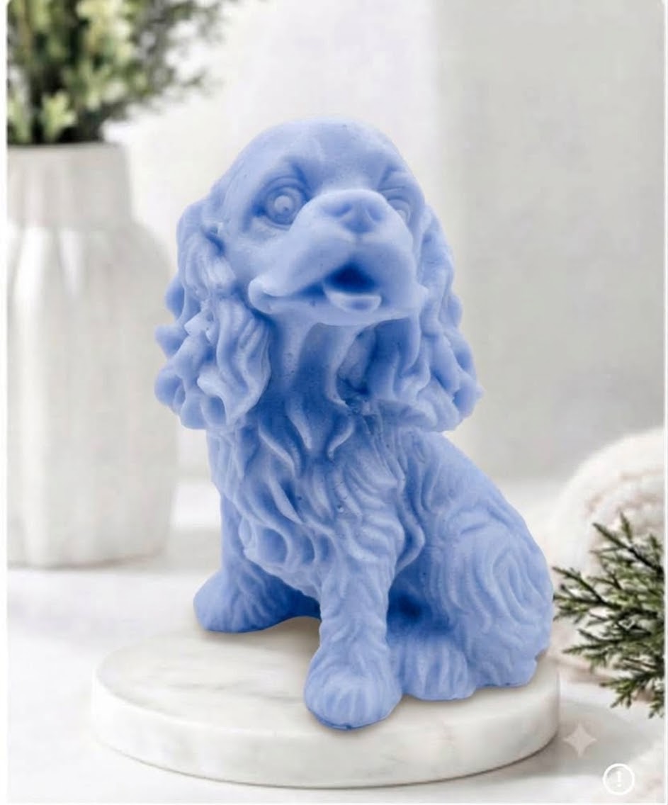 Handmade springer spaniel vegan soap sculpted in a sitting pose with textured fur and detailed floppy ears, resting on a marble display pedestal.