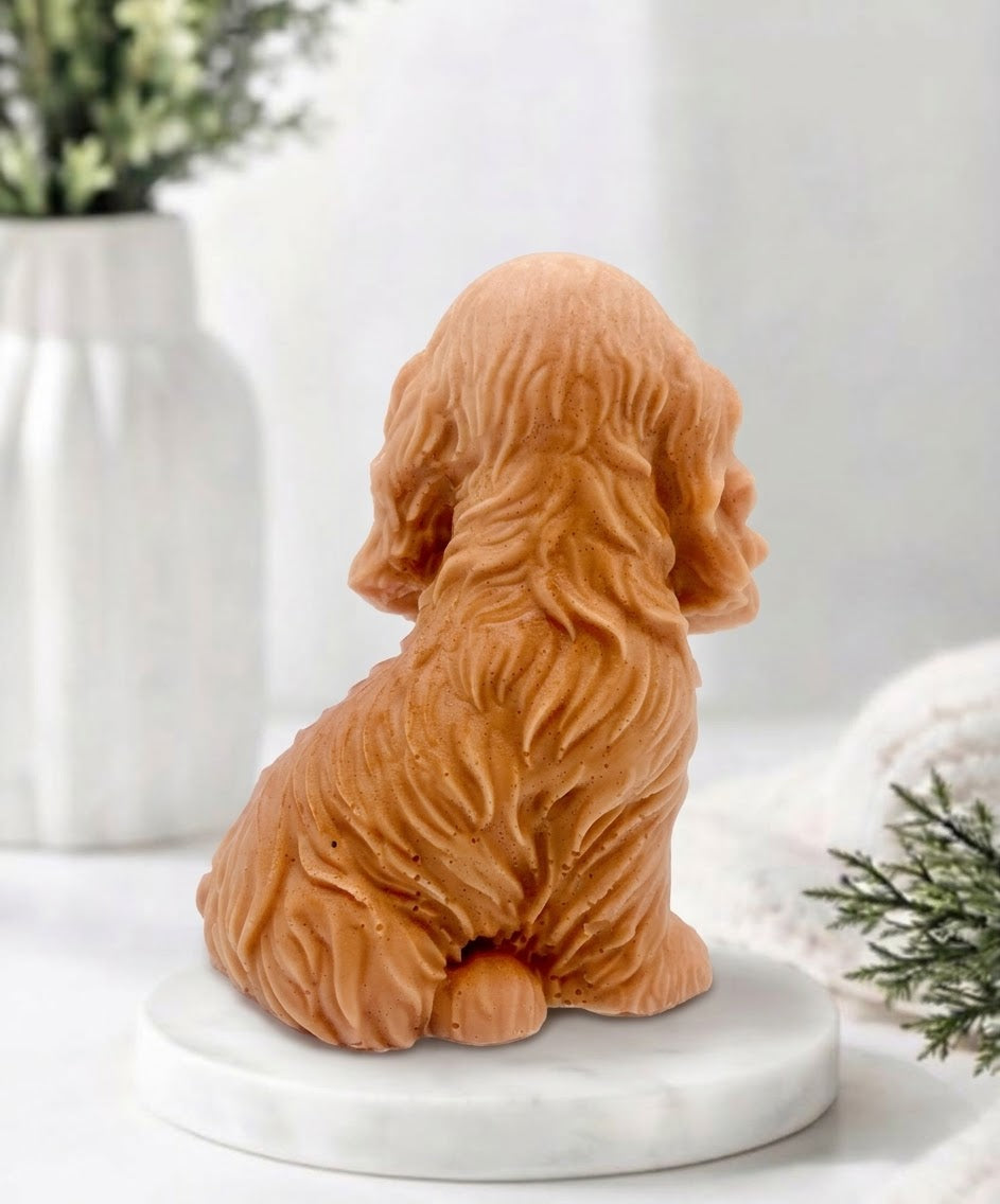 Handmade springer spaniel vegan soap sculpted in a sitting pose with textured fur and detailed floppy ears, resting on a marble display pedestal.