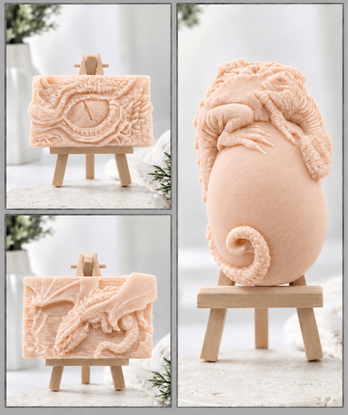 Three-panel product display showing a carved soft pink coloured vegan soaps on small wooden easels. The larger right panel shows a detailed dragon-like creature curled around an egg-shaped form with a curled tail; the left panels show a smaller matching carved plaque with embossed dragon artwork.