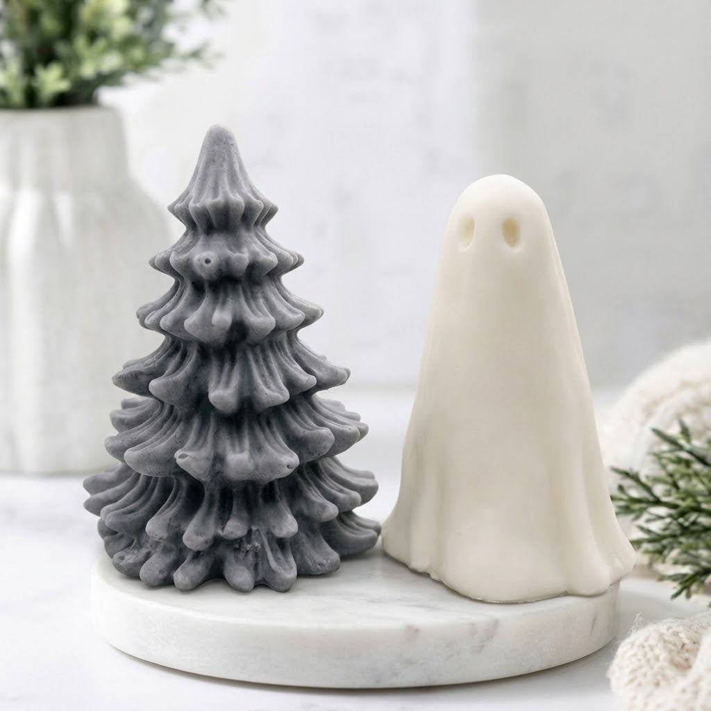 Handmade vegan soap gift set featuring a grey Christmas tree soap and a white ghost soap on a luxury white marble tray.