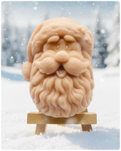 Load image into Gallery viewer, Handmade vegan traditional Santa Claus face shaped vegan soaps.  crafted with natural French clays, activated charcoal and essential oils. a eco-friendly, zero waste gift that’s cruelty-free, skin-nourishing, and perfect for Christmas gifts, secret Santa and stocking fillers. Small business UK
